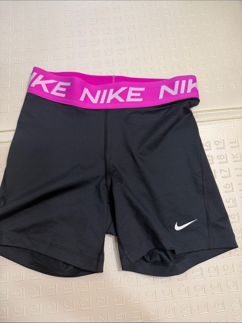 Nike Women’s Black Bike Shorts with Pink Logo Waistband